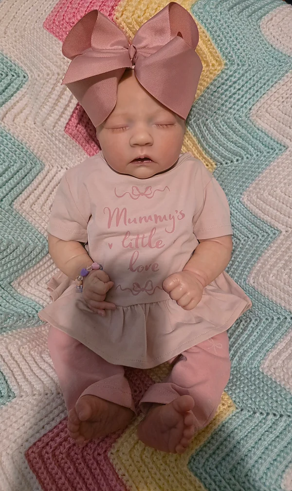 alma reborn doll by melissa's cradle