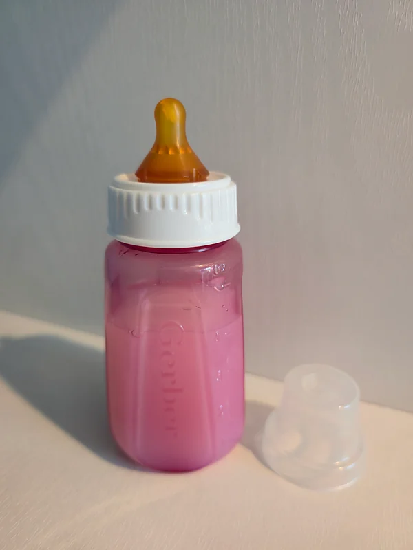 vintage gerber, red tinted, fake milk bottle reborn doll